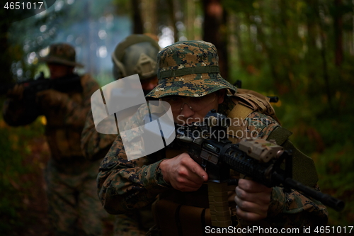 Image of Modern warfare Soldiers  Squad  in battle