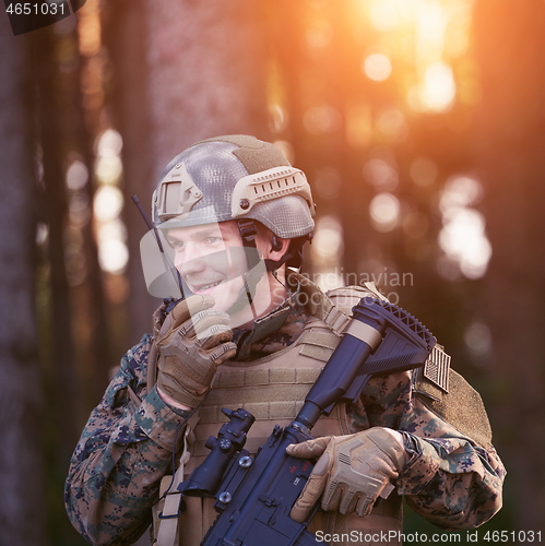 Image of Officer Talking Portable Radio Station