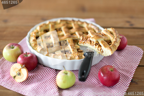 Image of close up of apple pie piece on kitchen knife