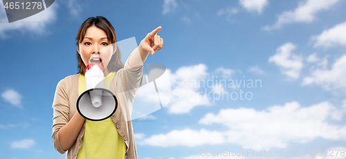 Image of asian woman speaking to megaphone