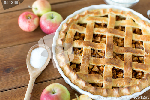 Image of close up of apple pie on wooden table