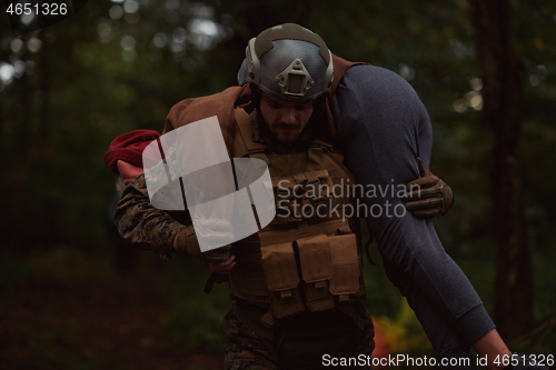 Image of soldier rescue civilian