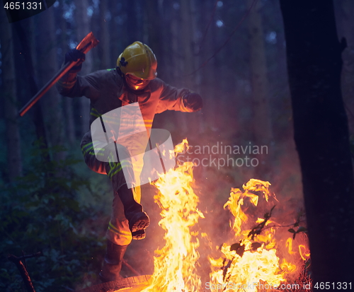 Image of firefighter in action