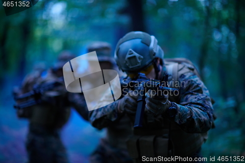 Image of Modern warfare Soldiers  Squad  in battle