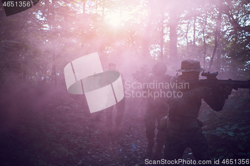 Image of Modern warfare Soldiers  Squad  in battle