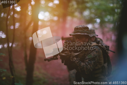 Image of Modern warfare Soldiers  Squad  in battle