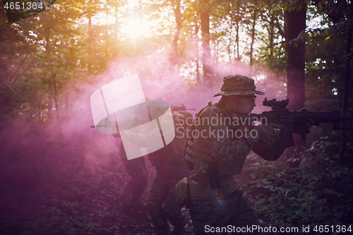 Image of Modern warfare Soldiers  Squad  in battle