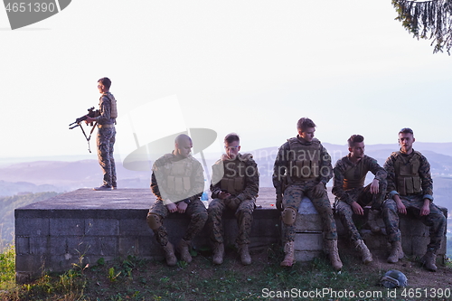 Image of soldiers squad relaxing