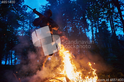 Image of Soldier in Action at Night