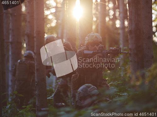 Image of Modern warfare Soldiers  Squad  in battle