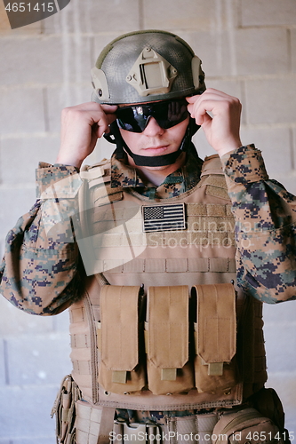 Image of soldier preparing