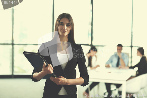 Image of business people group in a meeting at office