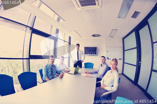 Image of business people in a meeting at office