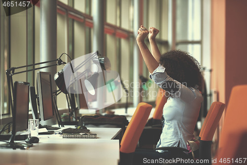 Image of young  business woman at office