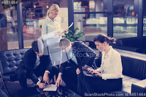 Image of business people in a meeting at office