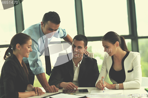 Image of business people group in a meeting at office