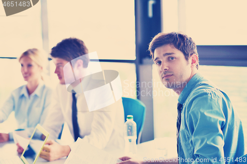 Image of business people in a meeting at office