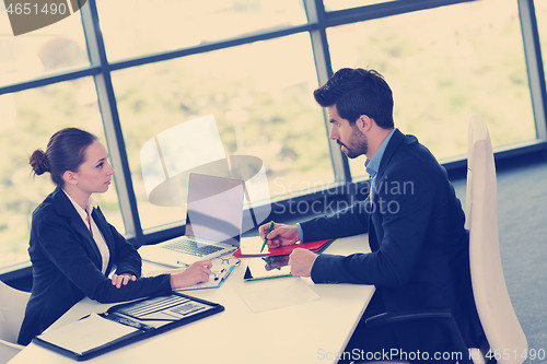 Image of business people group in a meeting at office