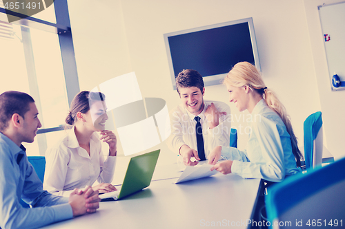 Image of business people in a meeting at office