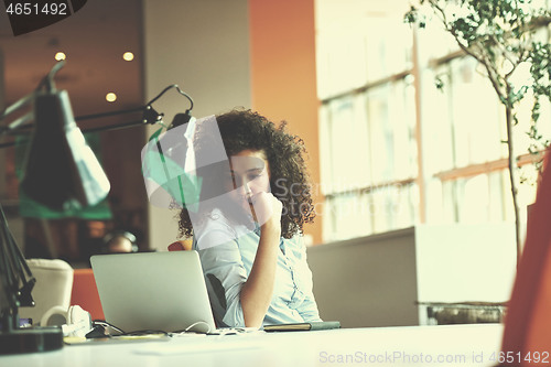 Image of young  business woman at office