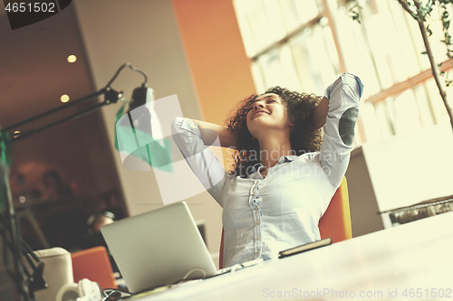 Image of young  business woman at office