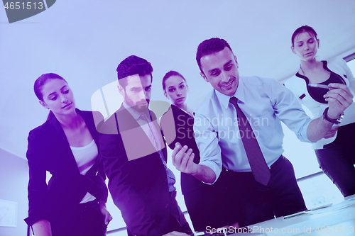 Image of business people in a meeting at office