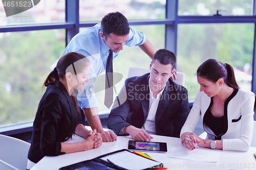 Image of business people group in a meeting at office