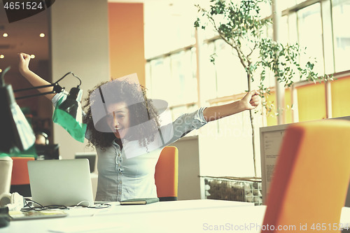 Image of young  business woman at office