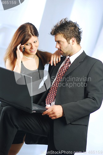Image of Pair with a notebook