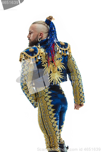 Image of Torero in blue and gold suit or typical spanish bullfighter isolated over white