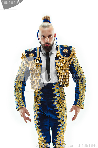 Image of Torero in blue and gold suit or typical spanish bullfighter isolated over white