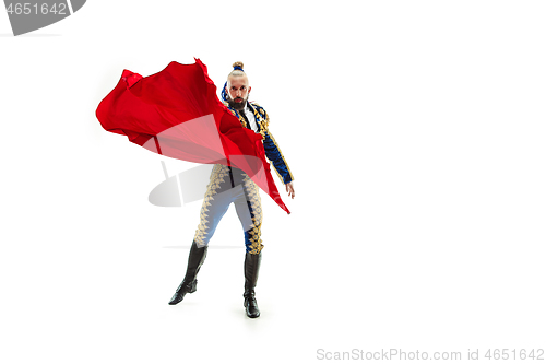 Image of Torero in blue and gold suit or typical spanish bullfighter isolated over white