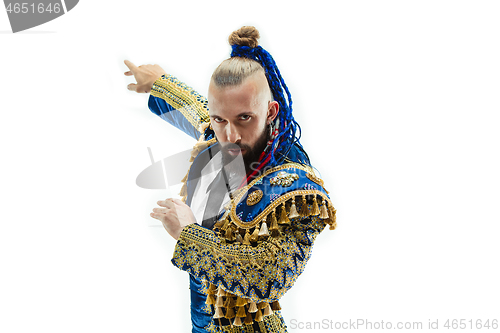 Image of Torero in blue and gold suit or typical spanish bullfighter isolated over white