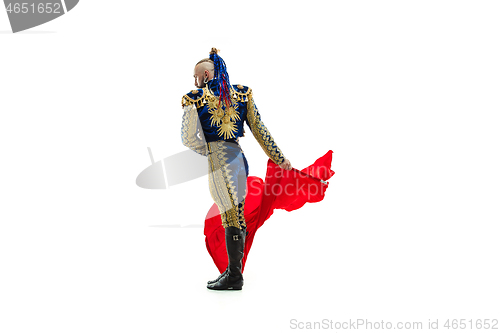 Image of Torero in blue and gold suit or typical spanish bullfighter isolated over white