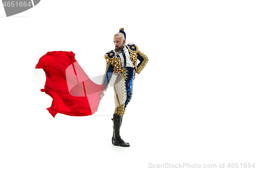 Image of Torero in blue and gold suit or typical spanish bullfighter isolated over white