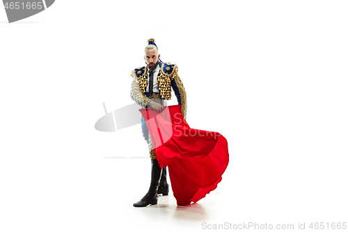 Image of Torero in blue and gold suit or typical spanish bullfighter isolated over white