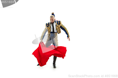 Image of Torero in blue and gold suit or typical spanish bullfighter isolated over white