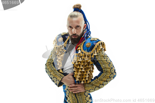 Image of Torero in blue and gold suit or typical spanish bullfighter isolated over white