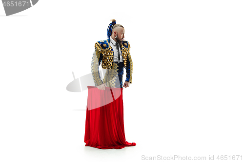 Image of Torero in blue and gold suit or typical spanish bullfighter isolated over white