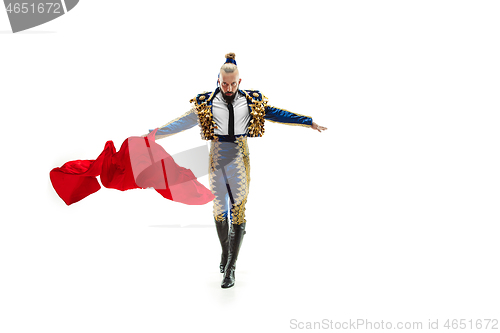 Image of Torero in blue and gold suit or typical spanish bullfighter isolated over white