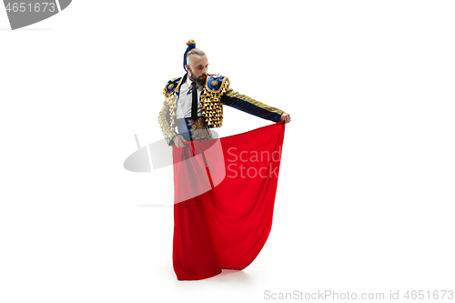 Image of Torero in blue and gold suit or typical spanish bullfighter isolated over white