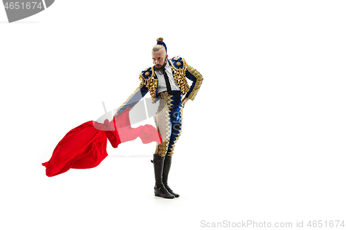 Image of Torero in blue and gold suit or typical spanish bullfighter isolated over white