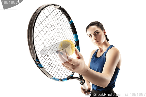 Image of Full length portrait of young woman playing tennis isolated on white background