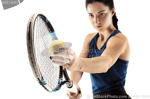 Image of Full length portrait of young woman playing tennis isolated on white background