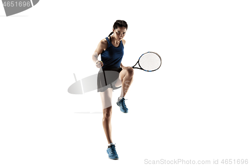 Image of Full length portrait of young woman playing tennis isolated on white background