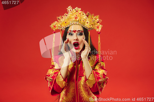 Image of Chinese traditional woman. Beautiful young girl wearing in national costume