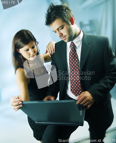 Image of Pair with a notebook