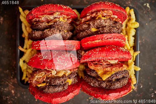 Image of Burgers placed on french fries