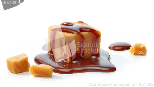 Image of caramel candy with chocolate sauce