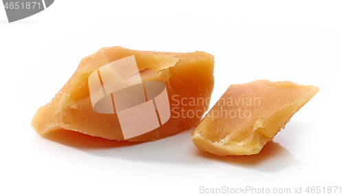 Image of caramel pieces on white background